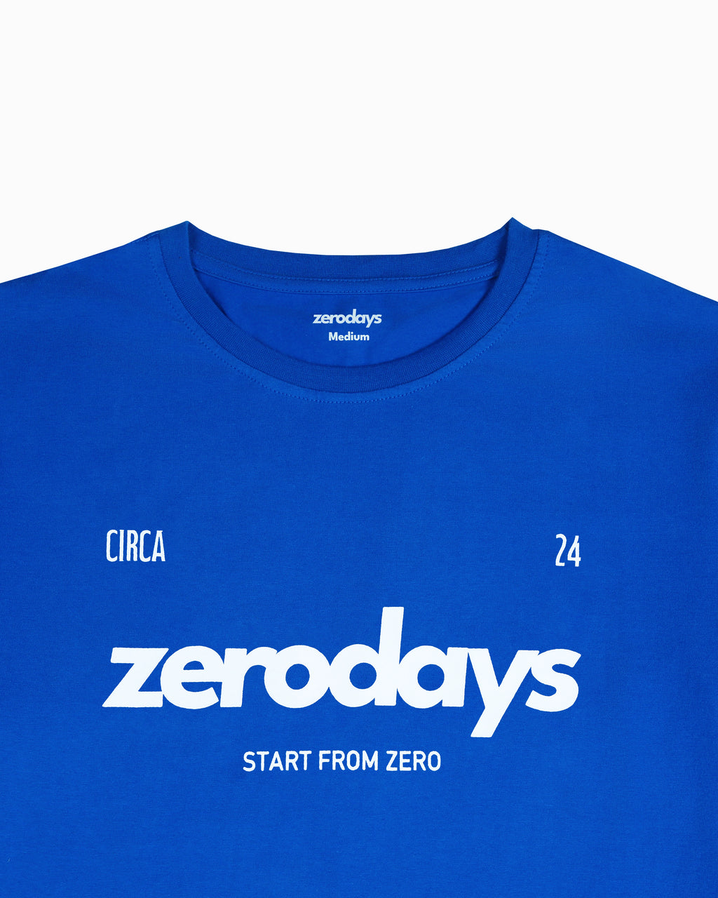 The closeup of the Zerodays Everyday Blue Tee shows the clean white design against the vibrant bliue high quality fabric.