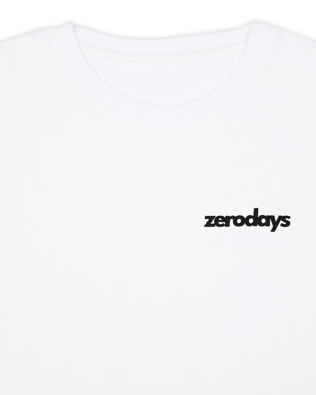 A closeup of the Zerodays basics white t-shirt with the beacn zerodays logo. 
