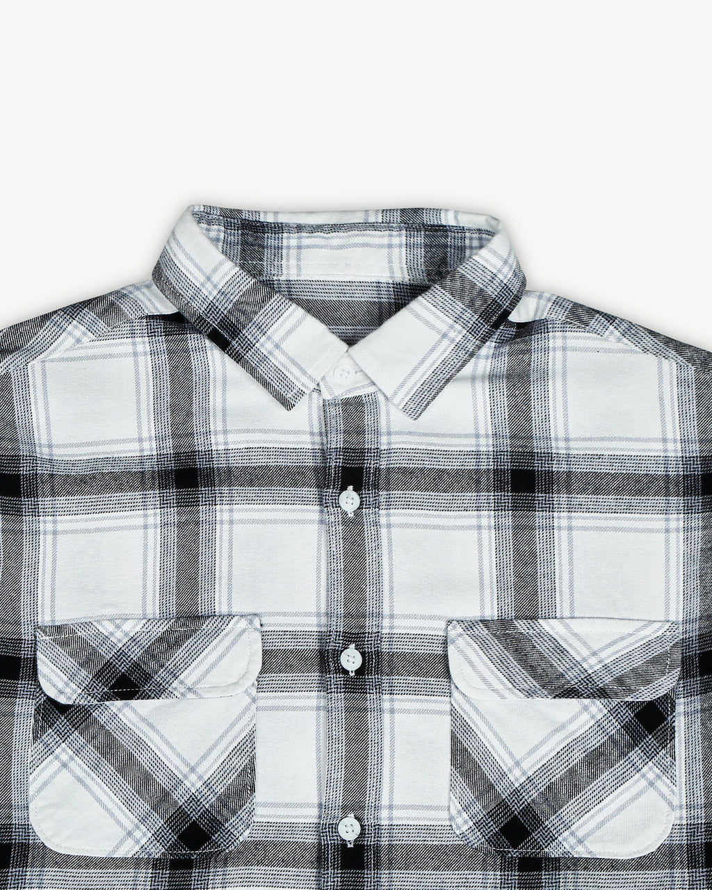 A front closeup of the Zerodays white flannel featuring double pockets on the shirt.